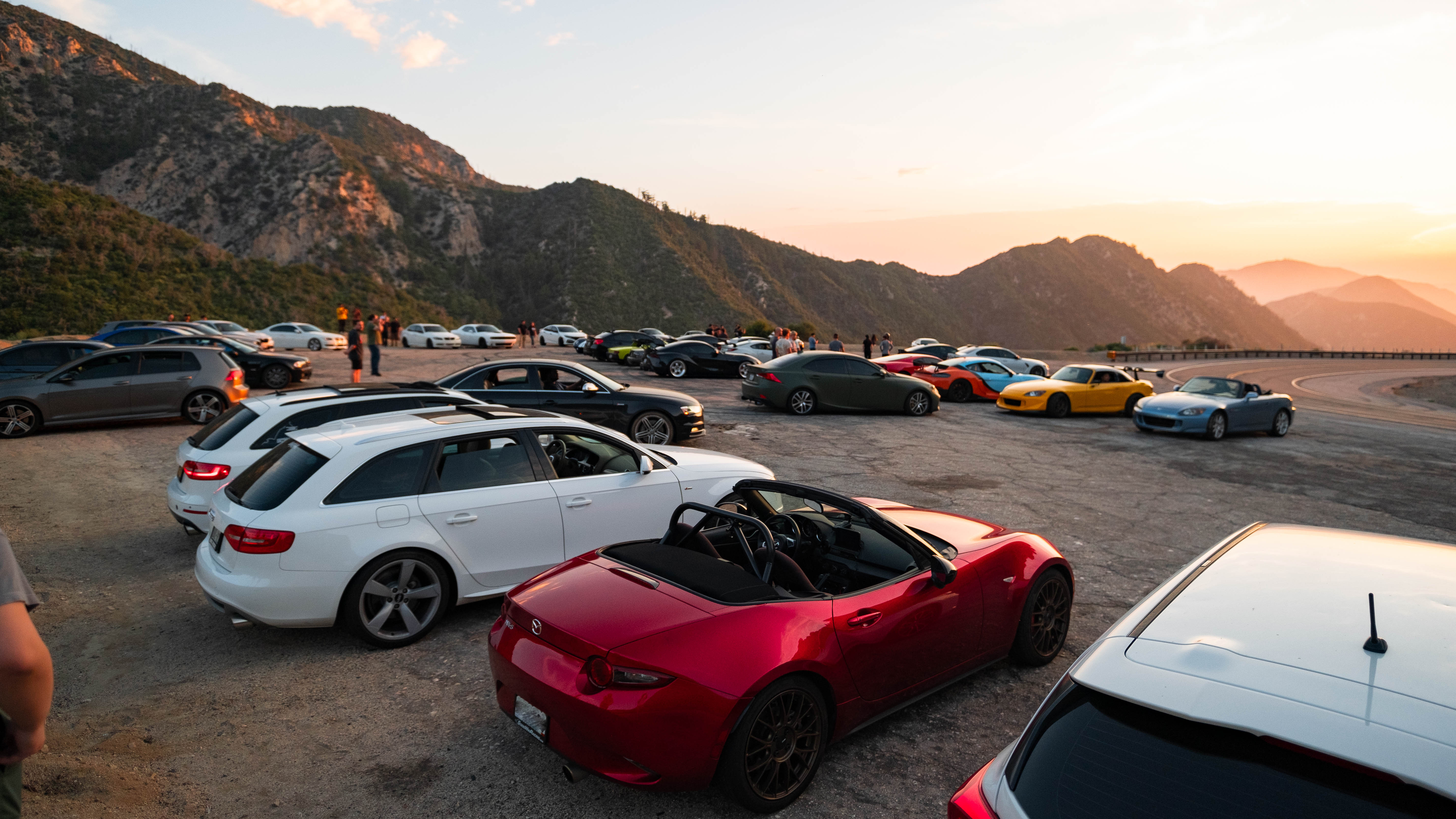 Drivers and cars gathering before heading out
